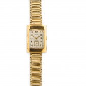 A FOURTEEN KARAT GOLD WRISTWAT