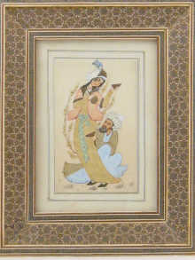 A framed and signed Persian