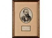 A framed autograph with photo