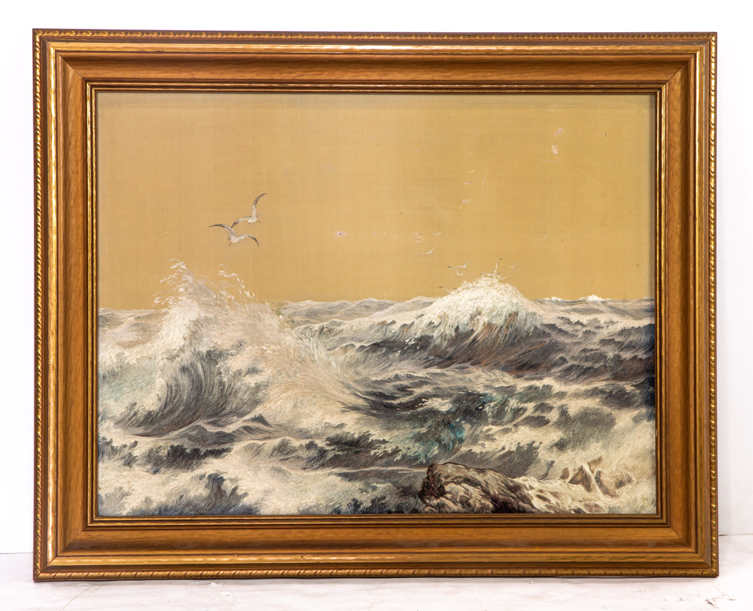 A FRAMED EMBROIDERY OF A SEASCAPE A