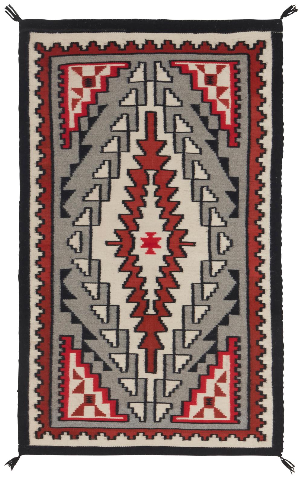 A FRAMED NAVAJO TEEC NOS POS RUGA