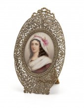 A FRAMED PORCELAIN PLAQUEA fra