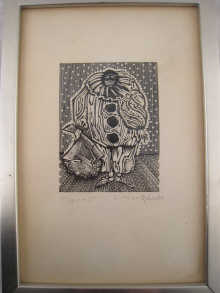 A framed print of Pierrot signed