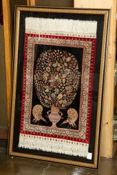 A FRAMED TURKISH SILK CARPET A