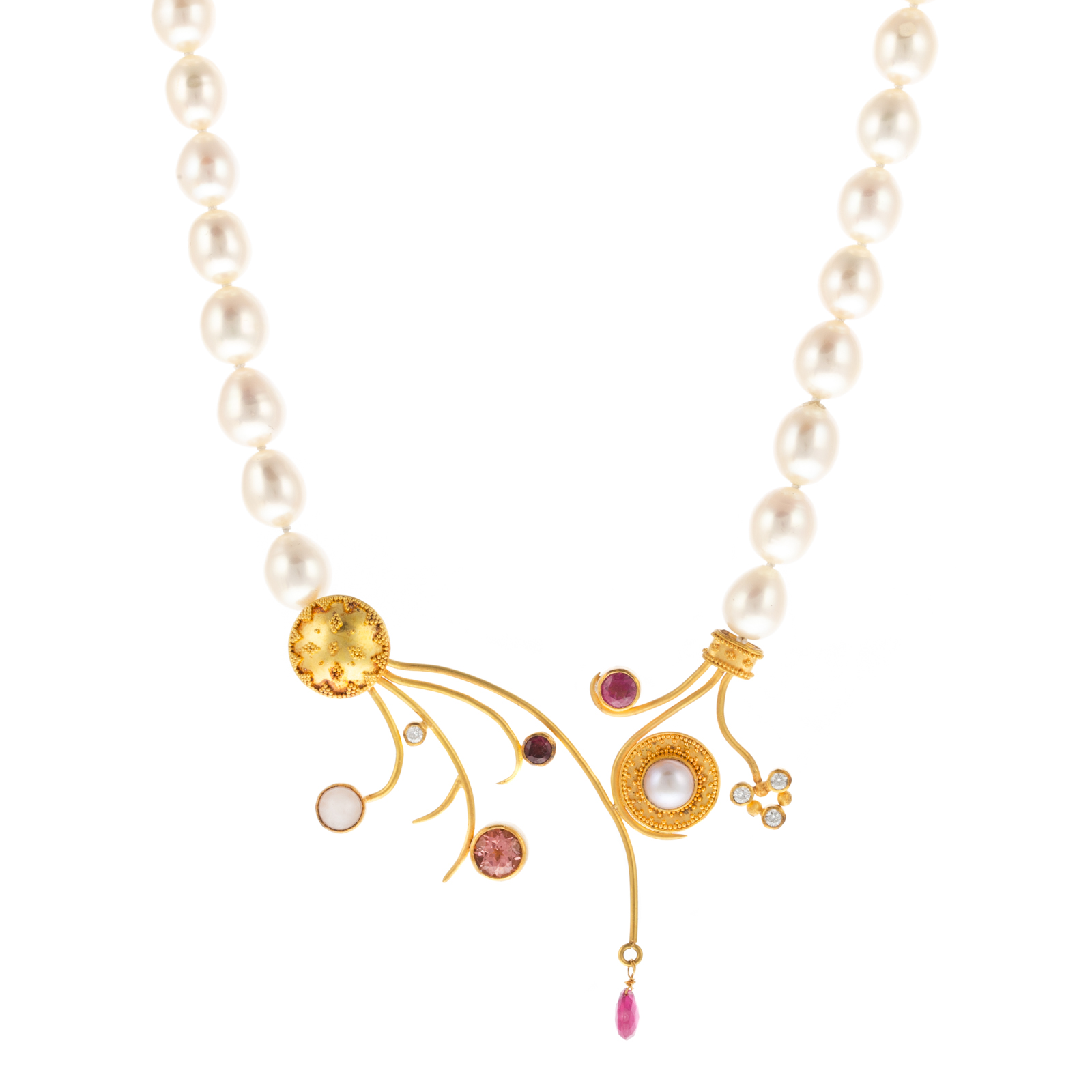 A FREEFORM 22K GEMSTONE, DIAMOND