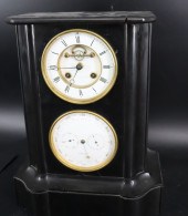 A FRENCH BLACK MARBLE CALENDAR
