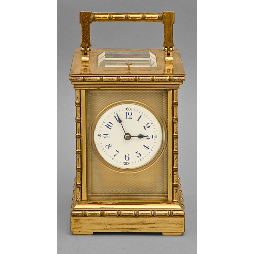 A French brass carriage clock,