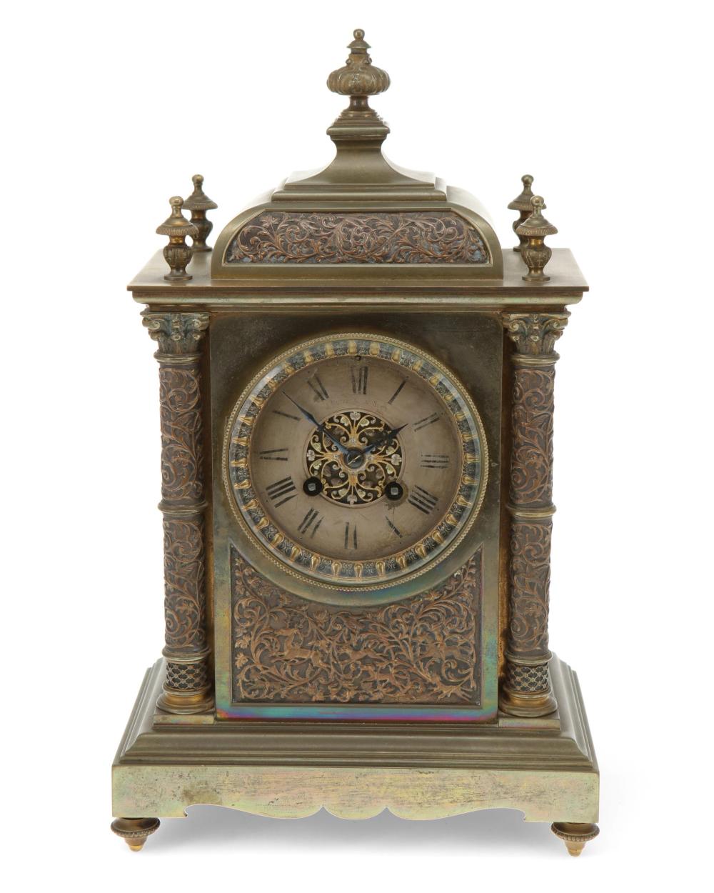 A FRENCH BRASS MANTEL CLOCKA French