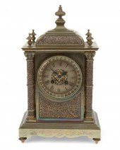 A FRENCH BRASS MANTEL CLOCKA F