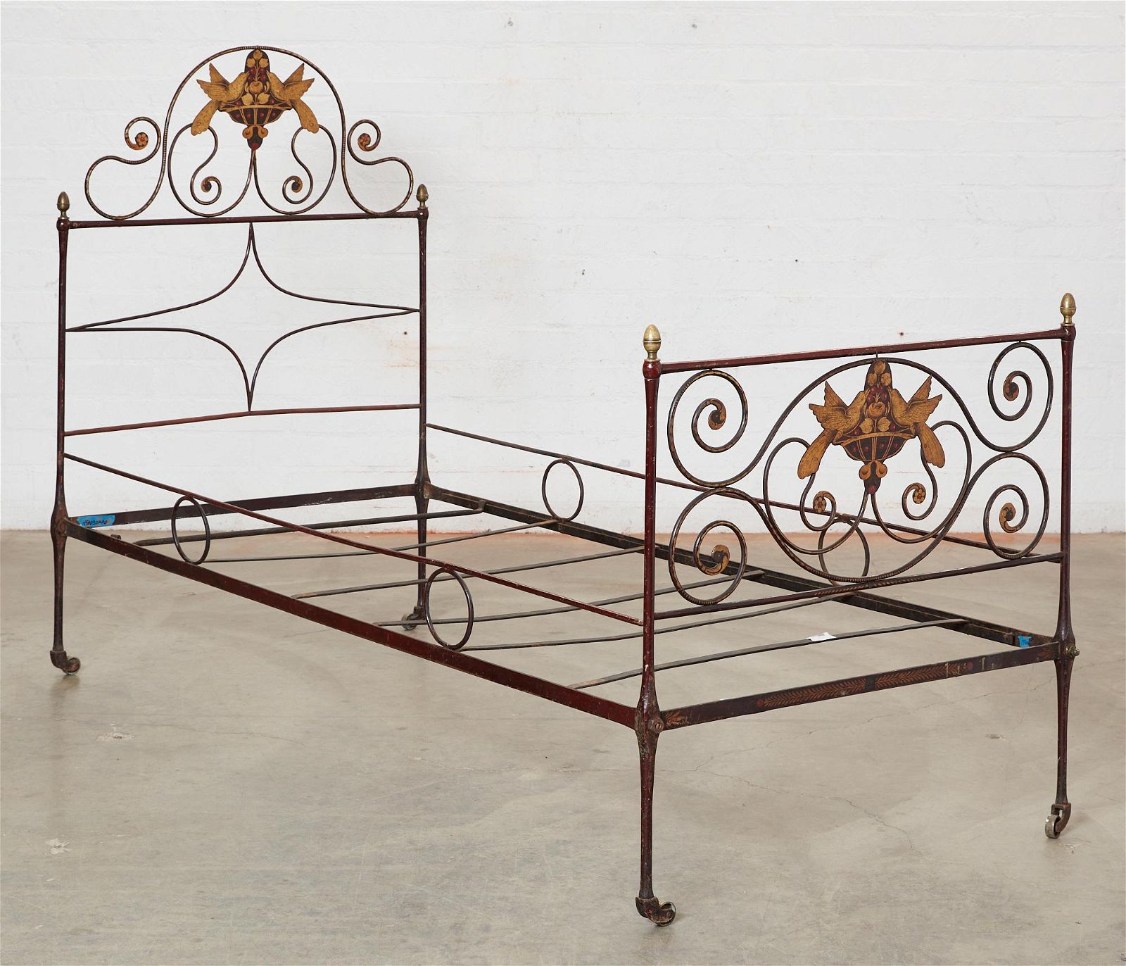A FRENCH BRASS MOUNTED IRON AND