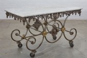 A FRENCH BRASS MOUNTED WROUGHT