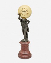 A FRENCH BRONZE AND BRASS MANT