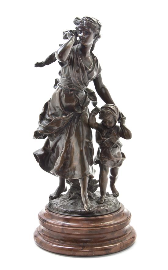 * A French Bronze Figural Group
