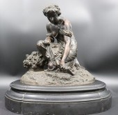A FRENCH BRONZE FIGURE OF A MA