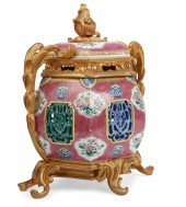 A FRENCH BRONZE MOUNTED CHINES