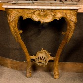 A FRENCH CARVED MARBLE TOP CON