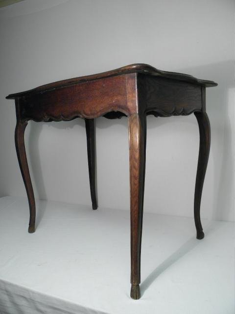 A French carved wood side table