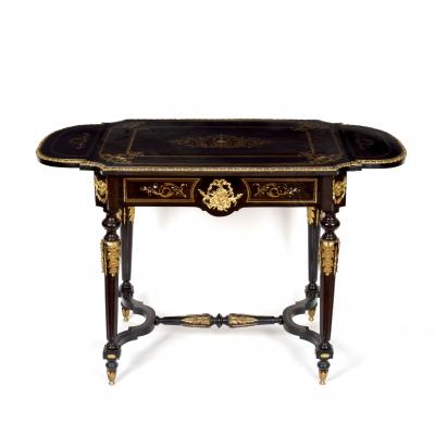 A French ebonised and gilt metal
