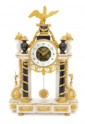 A FRENCH EMPIRE GILT BRONZE-MO