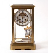 A French four-glass brass mant