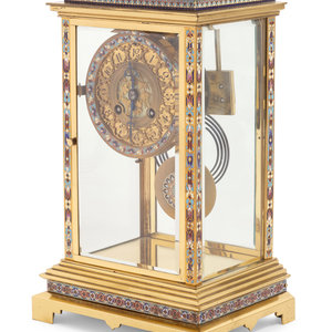 A French Gilt Brass and Champlevé