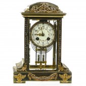 A FRENCH GILT BRASS AND JEWELE