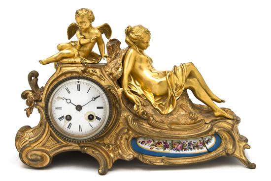 A French Gilt Bronze and Sevres