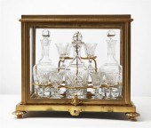 A FRENCH GILT BRONZE AND CLEAR