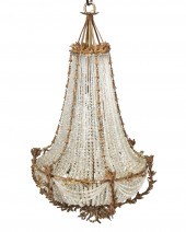 A FRENCH GILT-BRONZE AND CRYST
