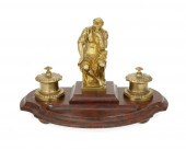 A FRENCH GILT-BRONZE AND MARBL