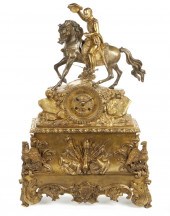 A FRENCH GILT-BRONZE CLOCK OF