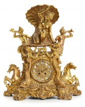 A FRENCH GILT-BRONZE FIGURAL M