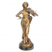 A FRENCH GILT BRONZE FIGURE OF