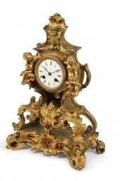 A FRENCH GILT BRONZE MANTEL CL