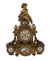 A FRENCH GILT-BRONZE MANTEL CL
