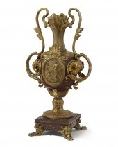 A FRENCH GILT-BRONZE ROUGE MAR