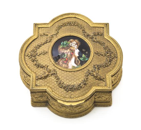 *A French Gilt Metal and Enameled