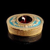 A FRENCH GILT METAL AND ENAMEL