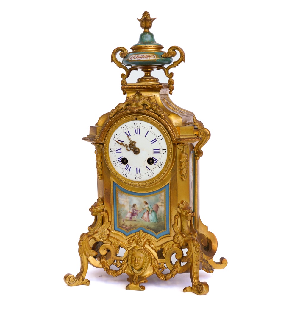 A FRENCH GILT-METAL MOUNTED PARIS