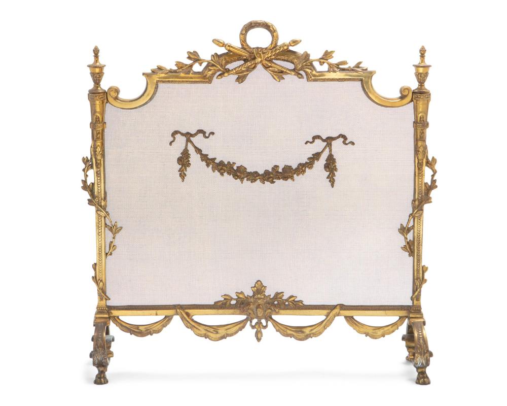 A FRENCH LOUIS XVI-STYLE BRASS FIRE