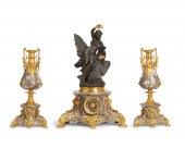A FRENCH MANTEL CLOCK AND GARN