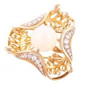 A FRENCH OPAL & DIAMOND BROOCH