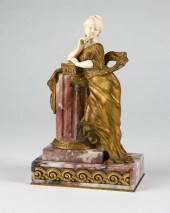 A French ormolu and ivory figu