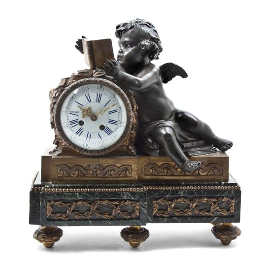 * A French Patinated and Gilt Metal