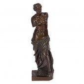 A FRENCH PATINATED BRONZE FIGU