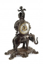 A FRENCH PATINATED BRONZE MANT