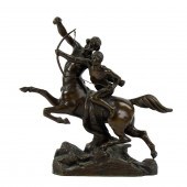 A FRENCH PATINATED BRONZE MODE