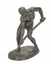 A FRENCH PATINATED BRONZE MODE
