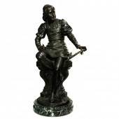 A FRENCH PATINATED METAL FIGUR