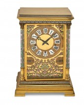 A FRENCH POLISHED BRASS AND CH